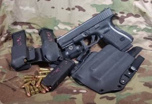 Glock 19 with the requisite accessories